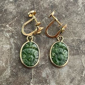 Vintage 14k carved jade twist on earrings.